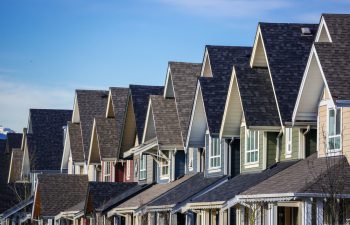 row of houses with roof shingles in Bay City, MI