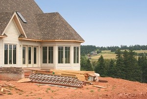 new home construction with vinyl siding on a hillside in Mount Pleasant, MI